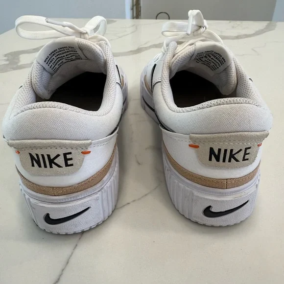 Nike women’s White and Black Sneakers - Picture 3 of 7